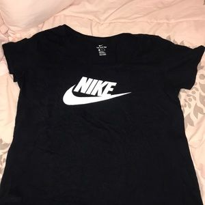 Black Nike tee with white logo